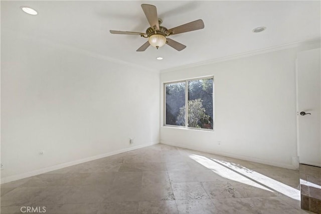 empty room with crown molding and ceiling fan