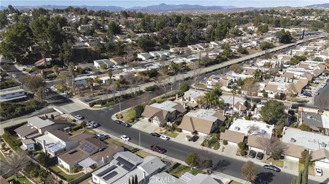 birds eye view of property with a residential view