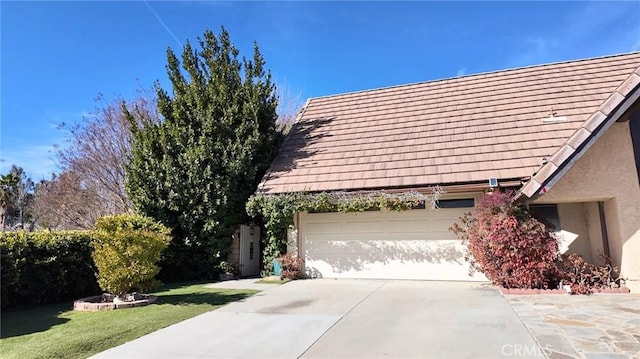 view of property exterior featuring a garage