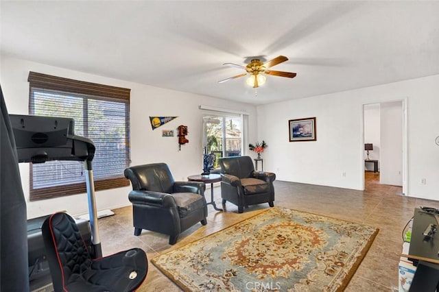 living room featuring tile patterned flooring and ceiling fan