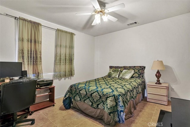 bedroom with light tile patterned flooring and ceiling fan