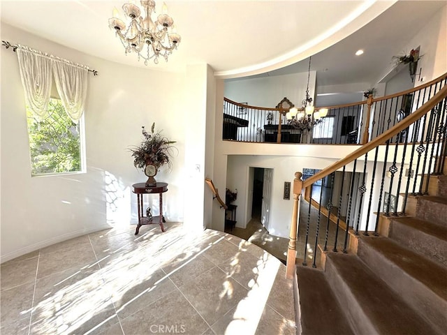 entryway featuring a notable chandelier