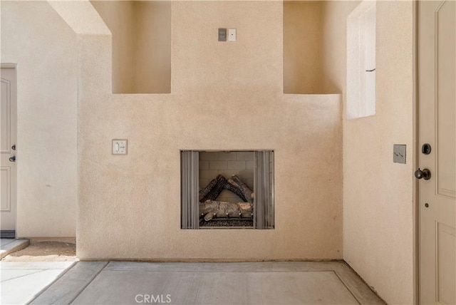 property entrance with a fireplace