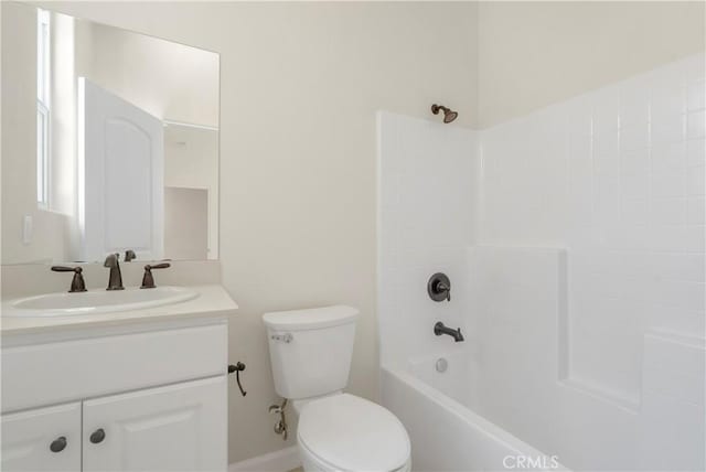 full bathroom featuring shower / bath combination, vanity, and toilet