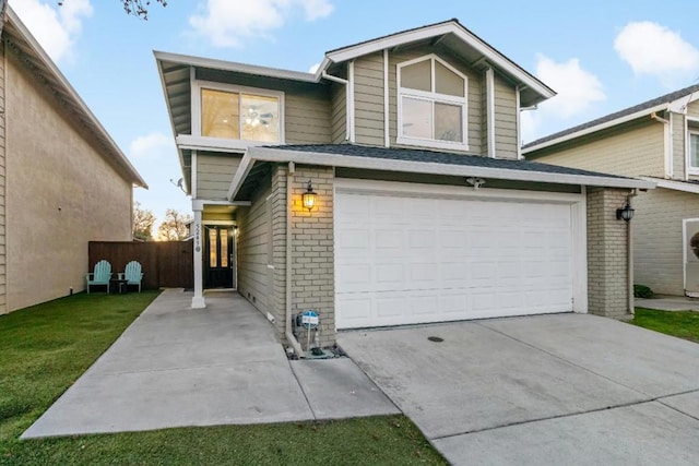 view of front of property with a garage