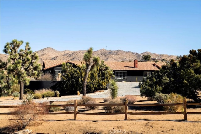 view of front facade featuring a mountain view