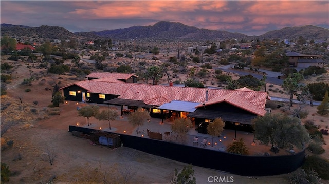 aerial view at dusk with a mountain view