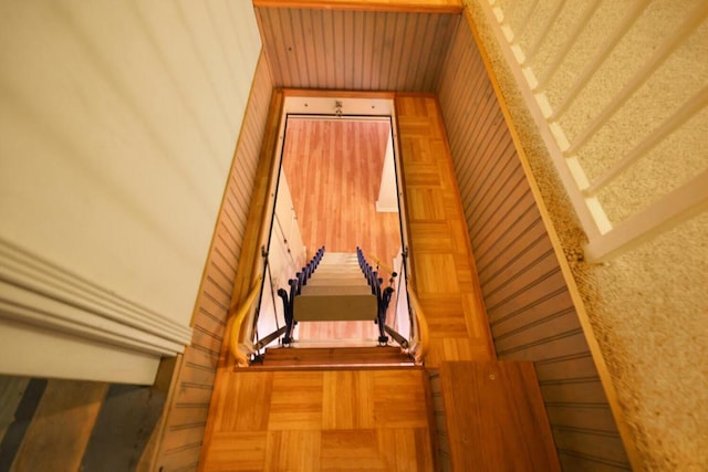 interior details featuring wood walls