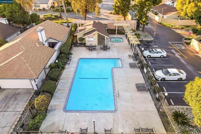 view of swimming pool with a pergola and a patio area