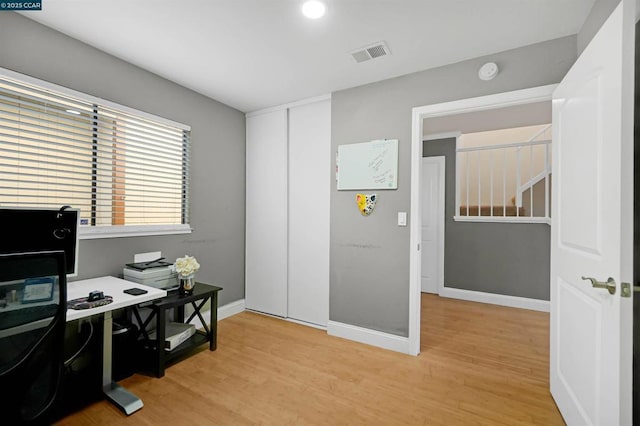 home office featuring light wood-type flooring