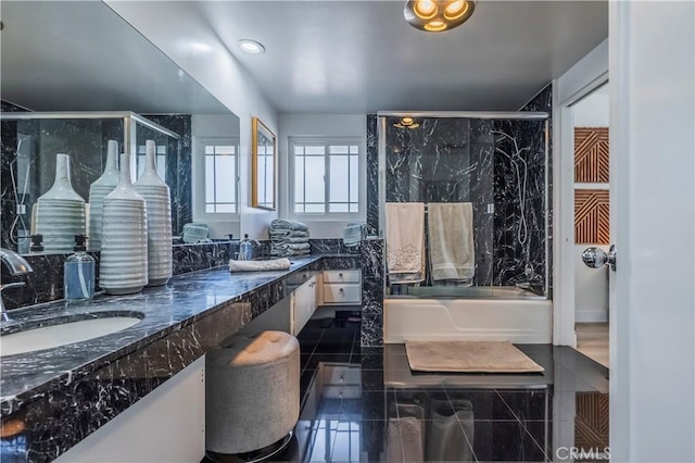 bathroom featuring vanity and shower with separate bathtub