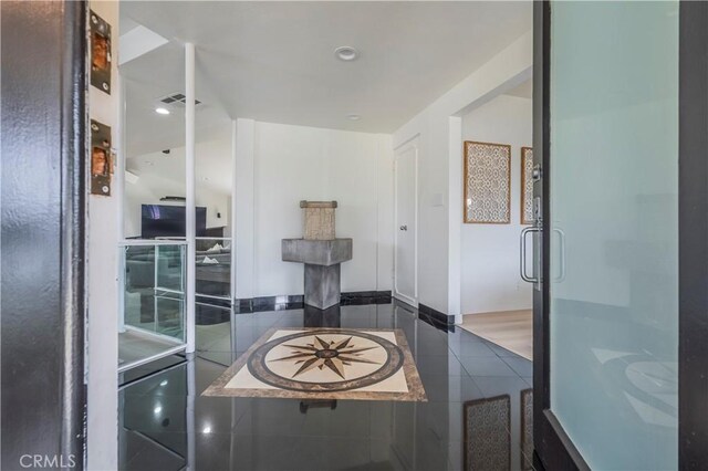 bathroom featuring tile patterned flooring