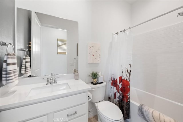 full bathroom featuring vanity, toilet, and shower / bath combo