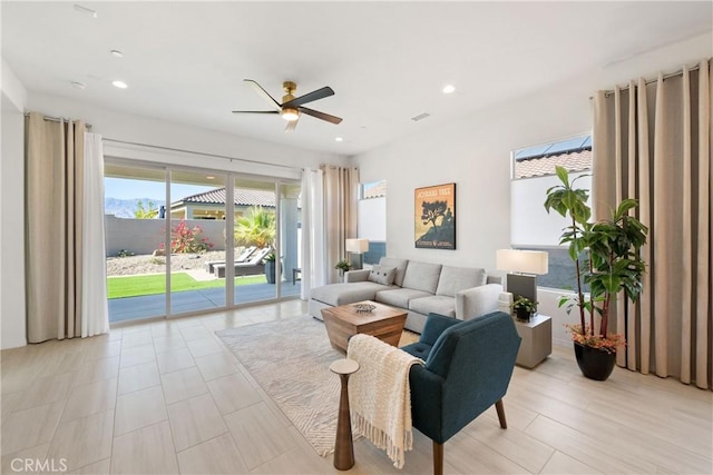 living room with ceiling fan