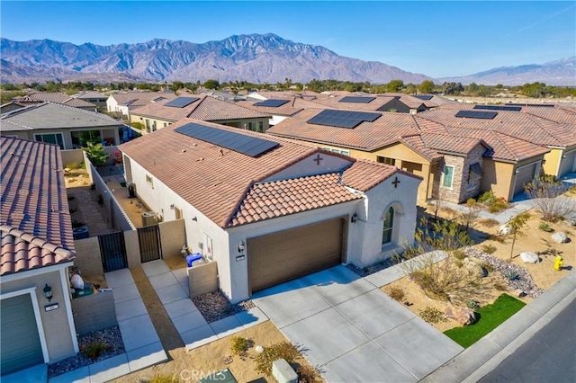 bird's eye view with a mountain view