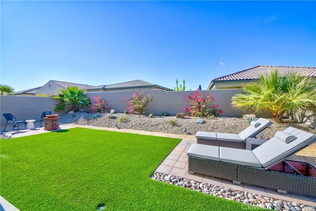 view of yard with a patio area