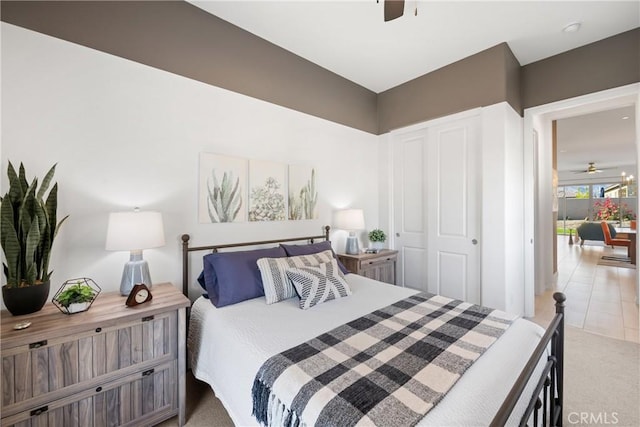 carpeted bedroom with ceiling fan