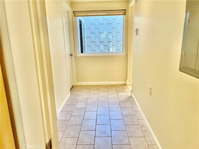 hallway featuring light tile patterned flooring