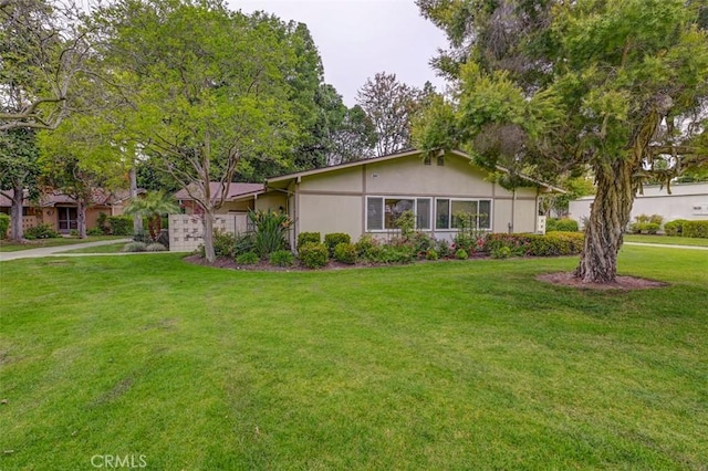 view of front of property with a front yard
