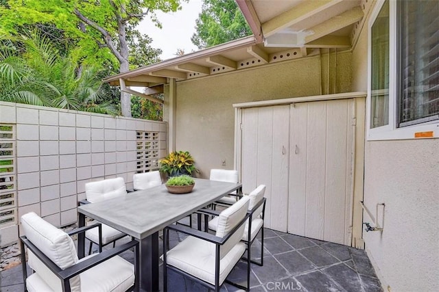 view of patio featuring outdoor dining space