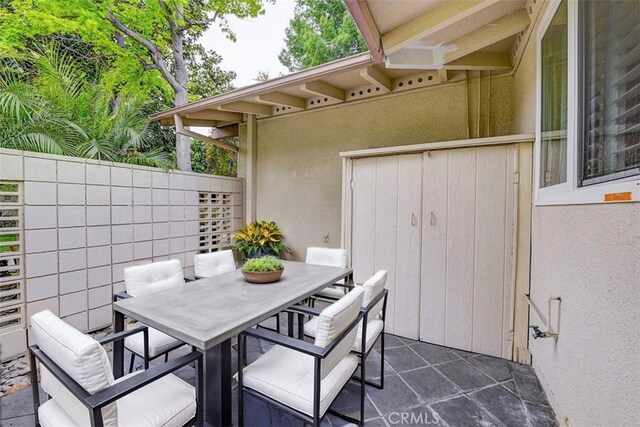 241 Calle Aragon Unit B, Laguna Woods, CA 92637 - view of patio featuring outdoor dining space