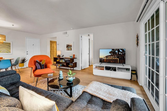 living room featuring light wood-type flooring