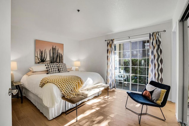 bedroom with wood-type flooring