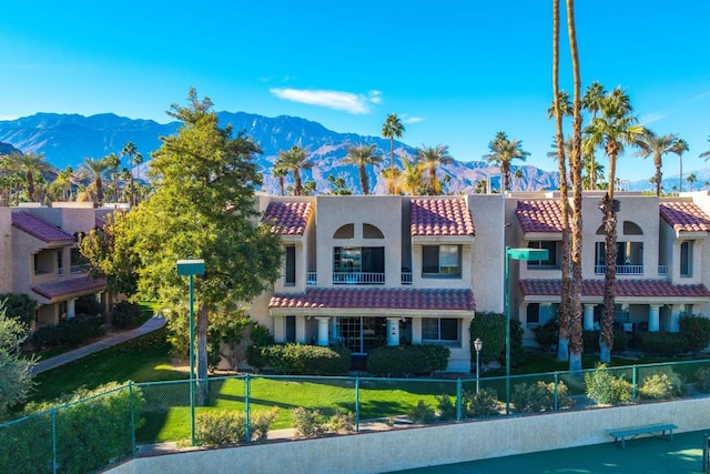 view of front of home featuring a mountain view