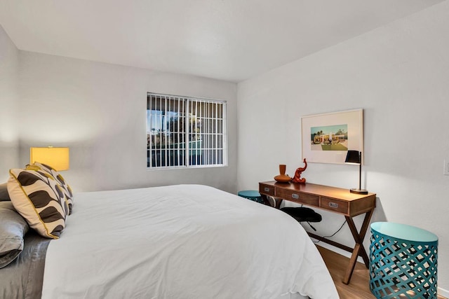 bedroom featuring hardwood / wood-style flooring