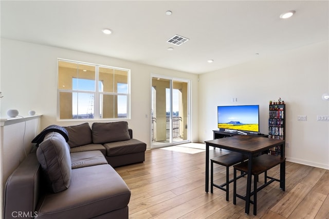 living room featuring light wood-type flooring