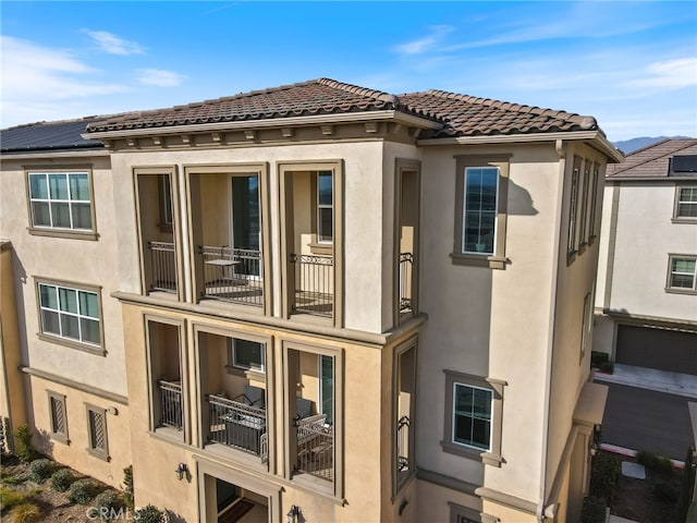 exterior space featuring a balcony