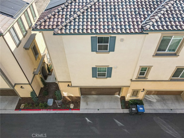 view of building exterior with a garage