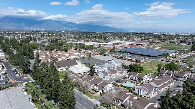 drone / aerial view featuring a mountain view and a residential view