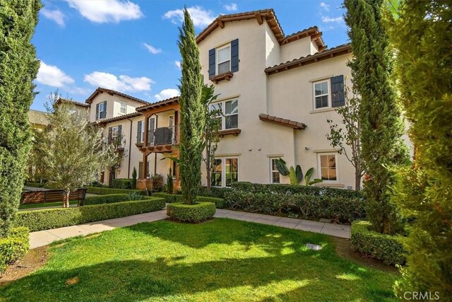 exterior space with a front yard