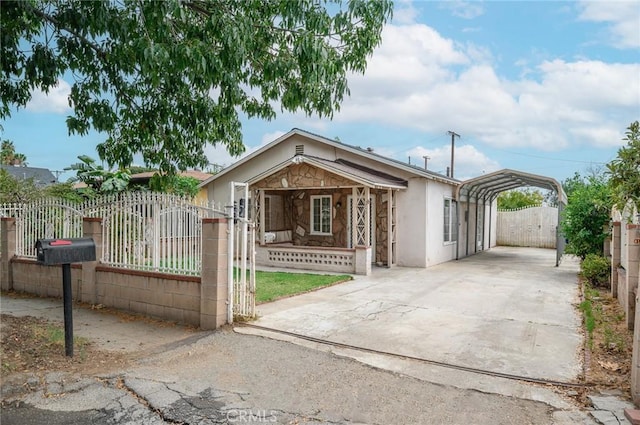 view of front of home featuring a carport