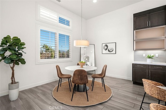 dining room featuring light hardwood / wood-style flooring