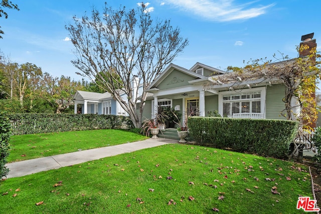 view of front of home with a front yard