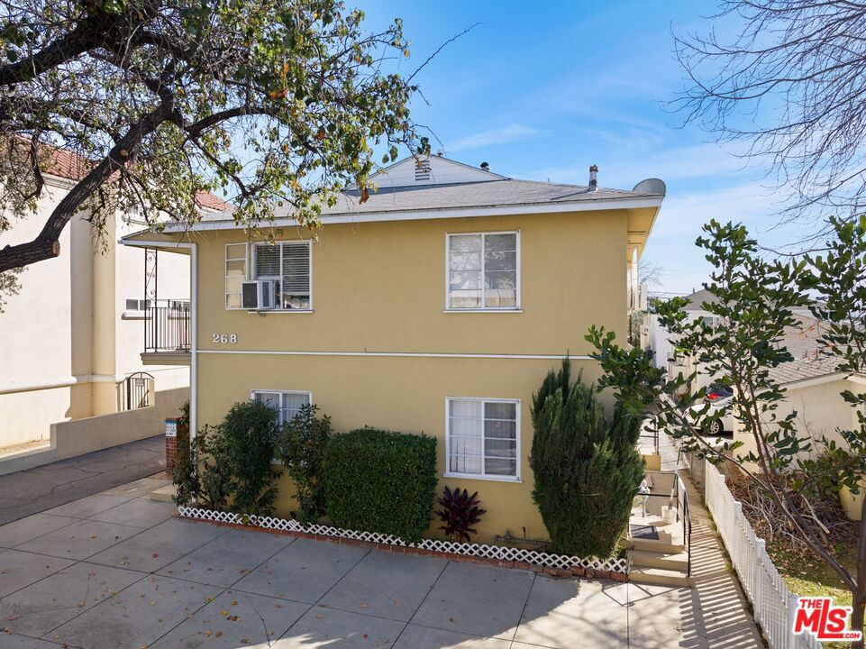 view of side of home featuring a patio area