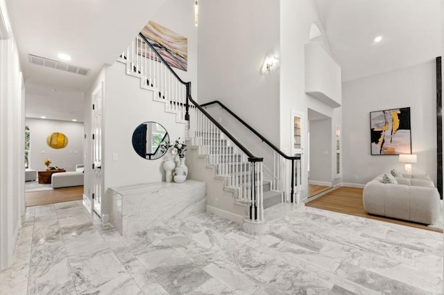 foyer with a high ceiling