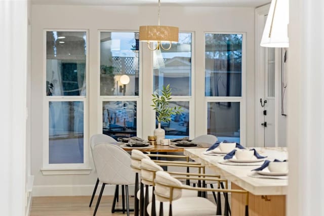 dining space featuring light hardwood / wood-style floors