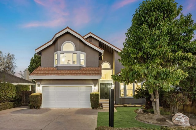 view of front of home with a garage