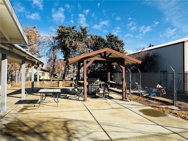 view of patio / terrace with a gazebo and grilling area