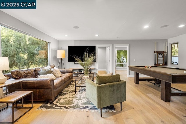 living room featuring pool table and light wood-type flooring