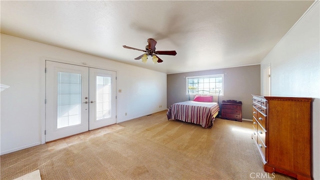 bedroom featuring a ceiling fan, baseboards, french doors, light carpet, and access to outside