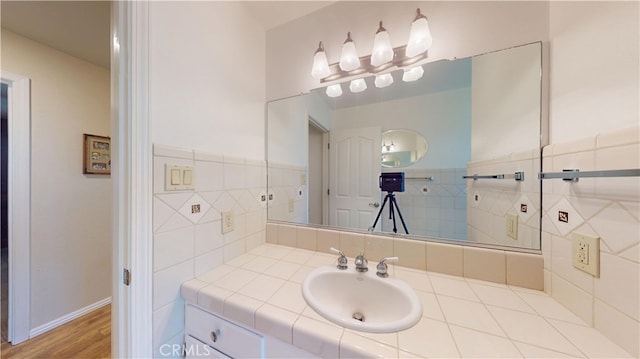 bathroom with vanity and wood finished floors