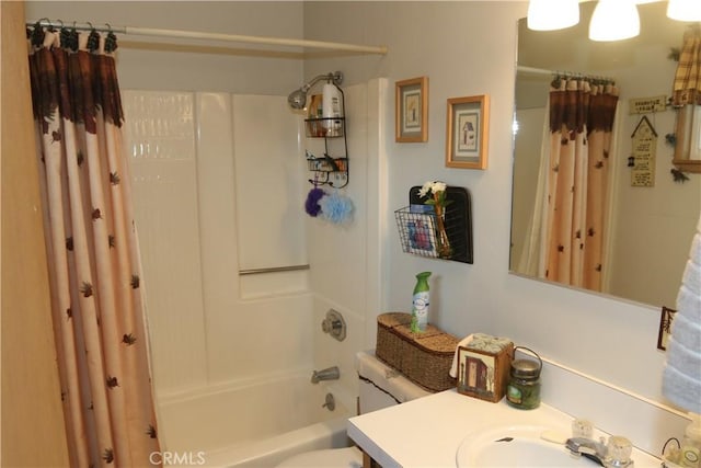 full bathroom featuring vanity, shower / tub combo, and toilet