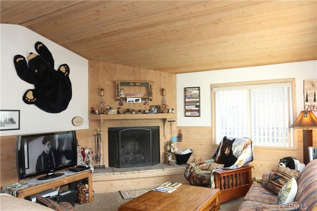 living room with lofted ceiling, wood ceiling, and wood walls