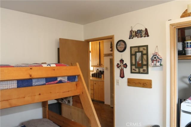 bedroom with washer / dryer