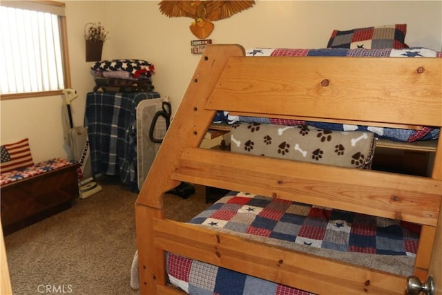 bedroom featuring carpet flooring