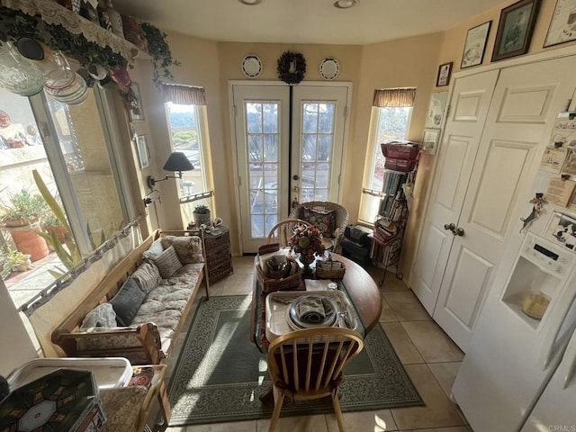 sunroom featuring french doors